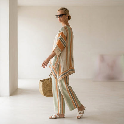 Elisabetta – top asimétrico elegante con pantalones de pierna ancha